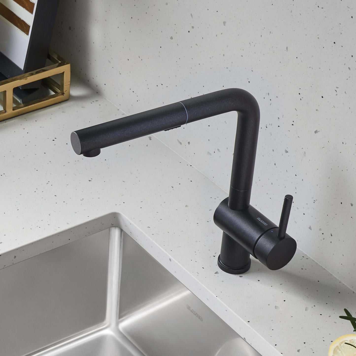 BLANCO Linus Low Arc Pull-Out Dual-Spray Kitchen Faucet - Anthracite installed in modern kitchen setting.