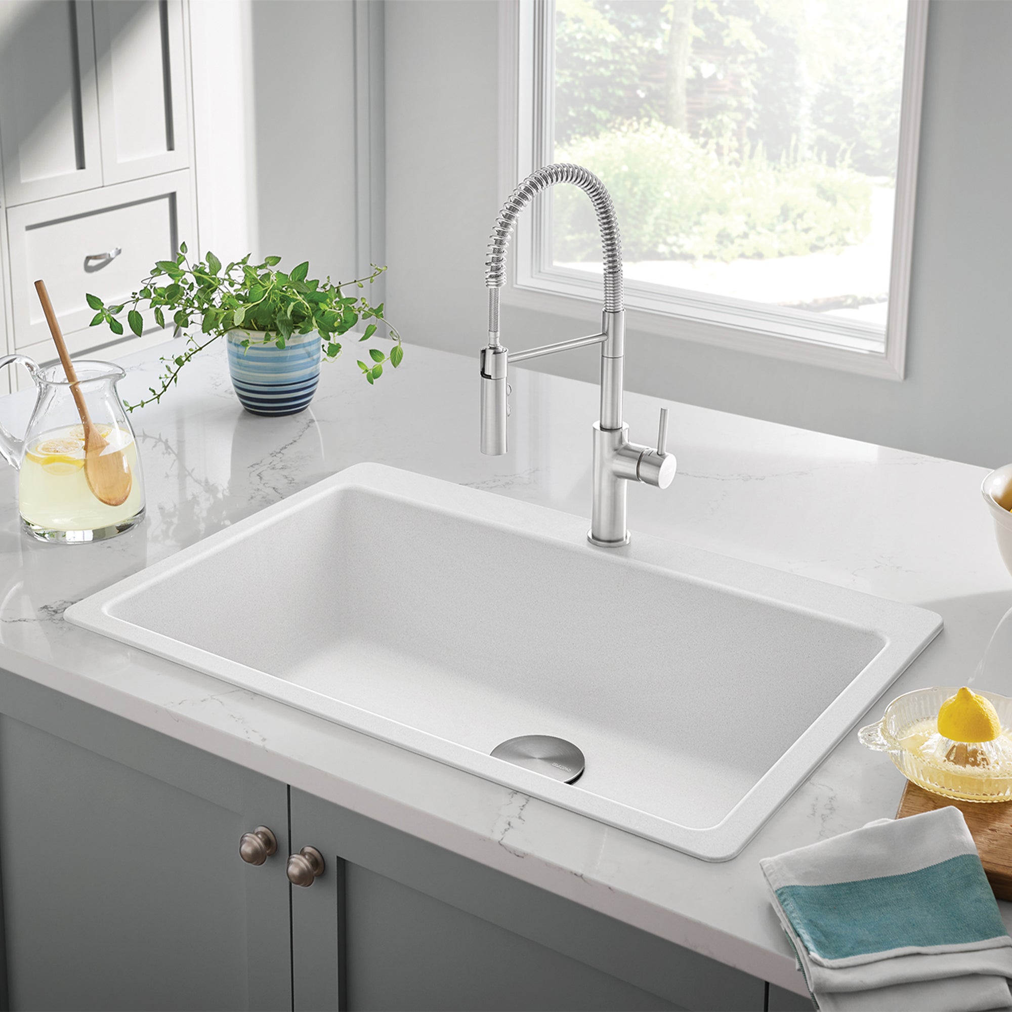 BLANCO Catris Semi-Pro Pull-Down Dual-Spray Kitchen Faucet in a modern white kitchen sink setting.