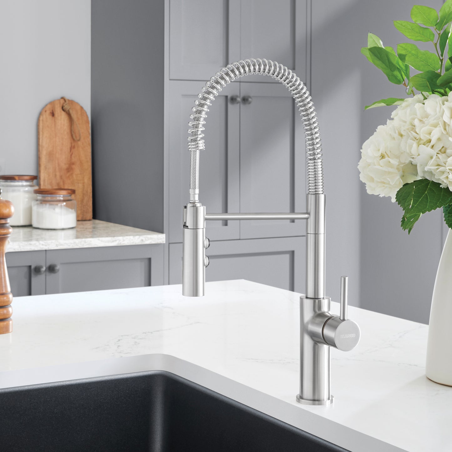 BLANCO Catris Semi-Pro Pull-Down Dual-Spray Kitchen Faucet installed in modern kitchen with spring-coil design.