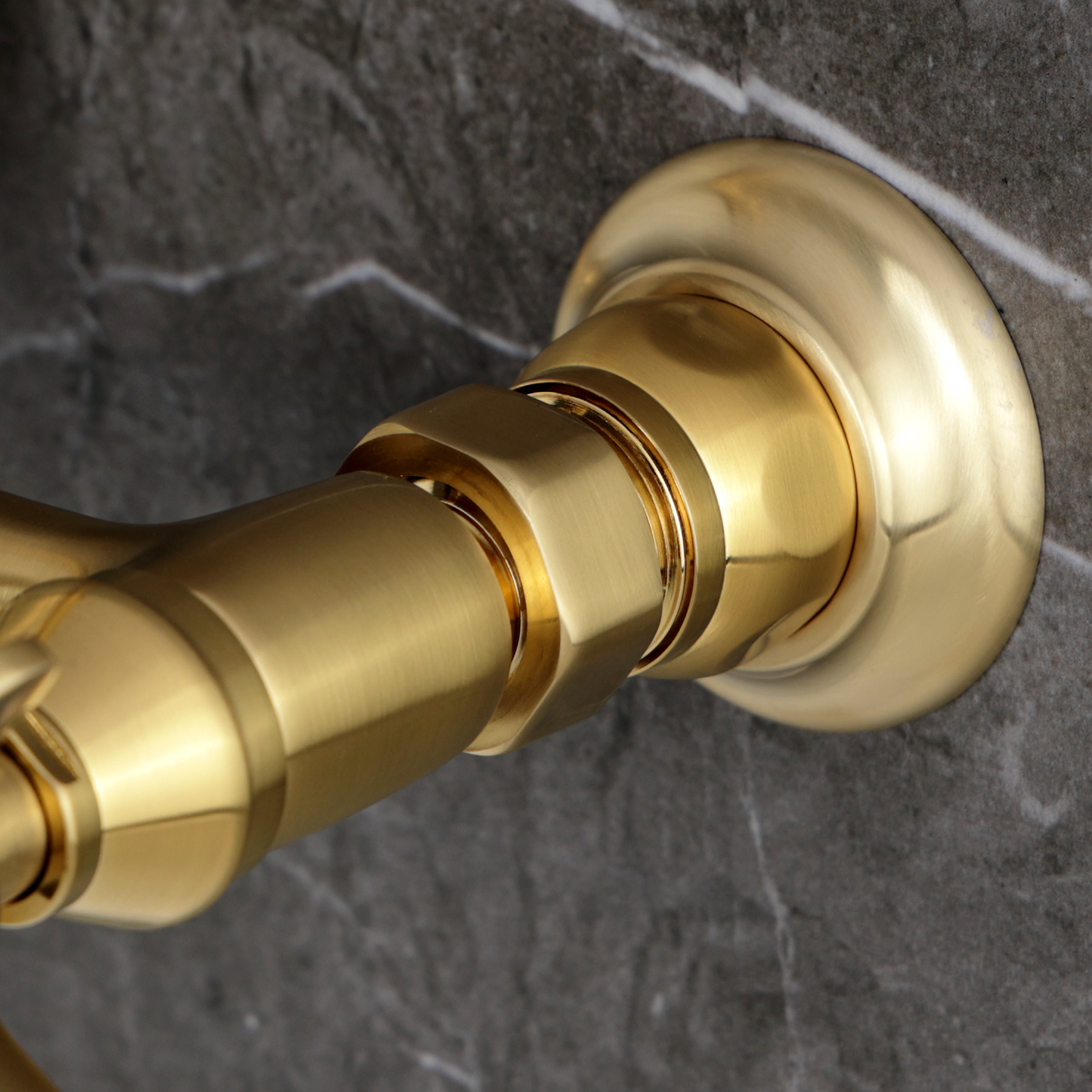 Kingston KS3253BEX Essex Two-Handle Wall Mount Bridge Kitchen Faucet, Antique Brass close-up detail