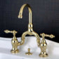 KINGSTON Brass English Country Bridge Bathroom Faucet with Brass Pop-Up - Polished Brass