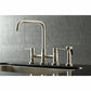 Kingston KS8287DLBS Concord Bridge Kitchen Faucet with Brass Sprayer, Brushed Brass on a black sink.