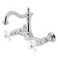 Kingston KS1263PX Heritage Two-Handle Wall Mount Bridge Kitchen Faucet, Antique Brass with white handles and polished chrome finish