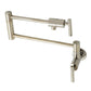 Kingston Brass KS4103CML Manhattan Wall Mount Pot Filler Faucet, Antique Brass with polished nickel finish.