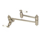 Kingston Brass KS3103PL Restoration Wall Mount Pot Filler Faucet, Antique Brass in polished nickel finish.