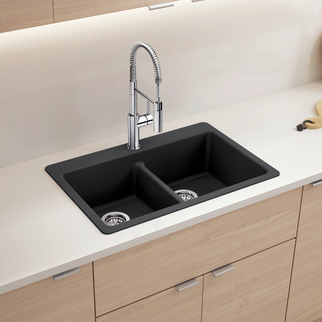 BLANCO Catris Semi-Pro Pull-Down Dual-Spray Kitchen Faucet installed over a modern double sink on a countertop.