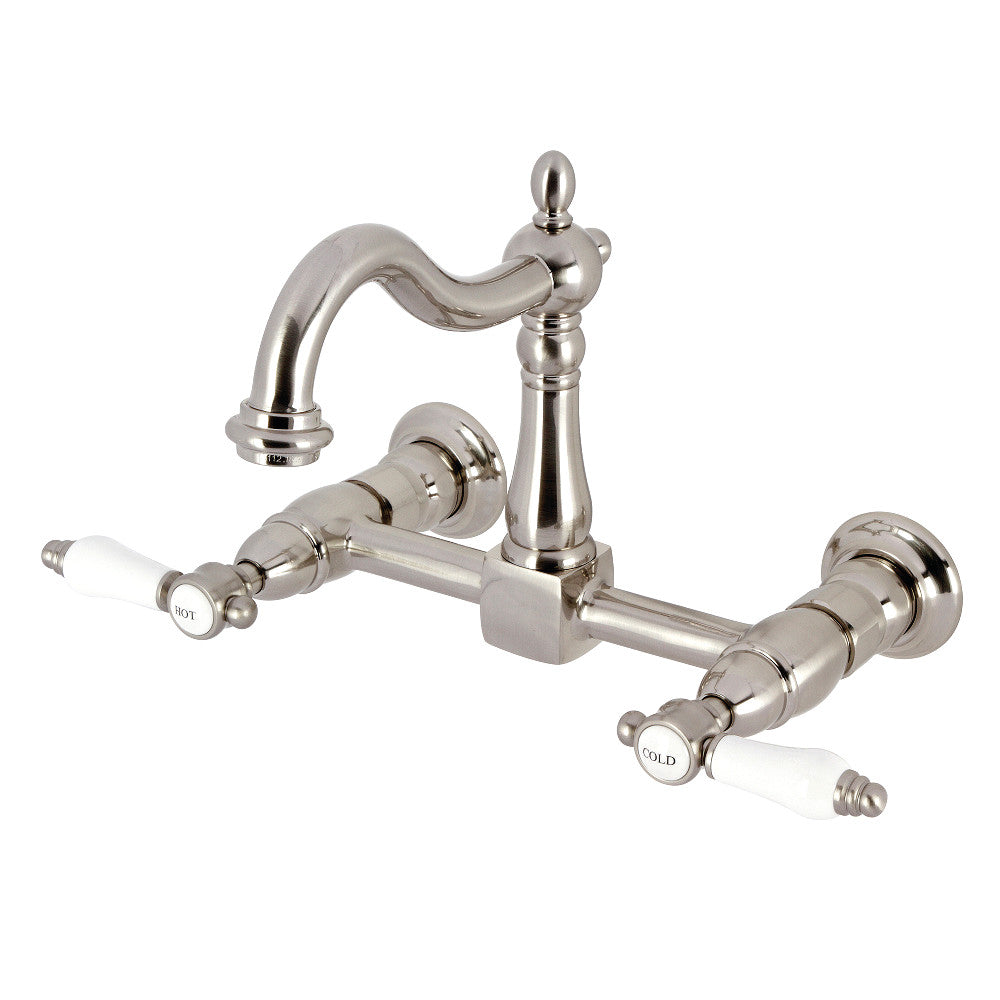 Kingston KS1263BPL Bel-Air Two-Handle Wall Mount Bridge Kitchen Faucet, Antique Brass in brushed nickel finish with porcelain levers.