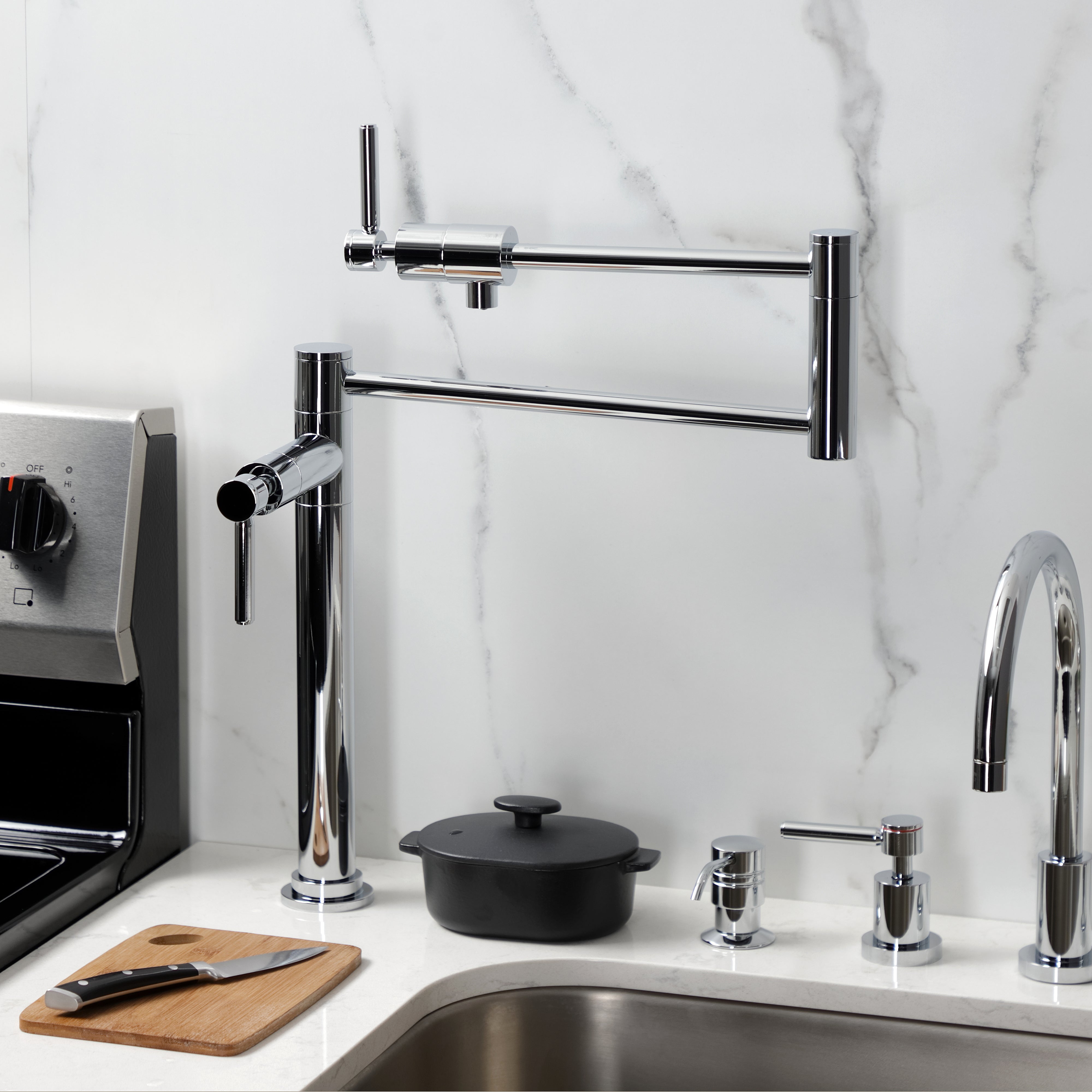 Kingston Brass KS4703DL Concord Deck Mount Pot Filler Faucet, Antique Brass in a modern kitchen setting.