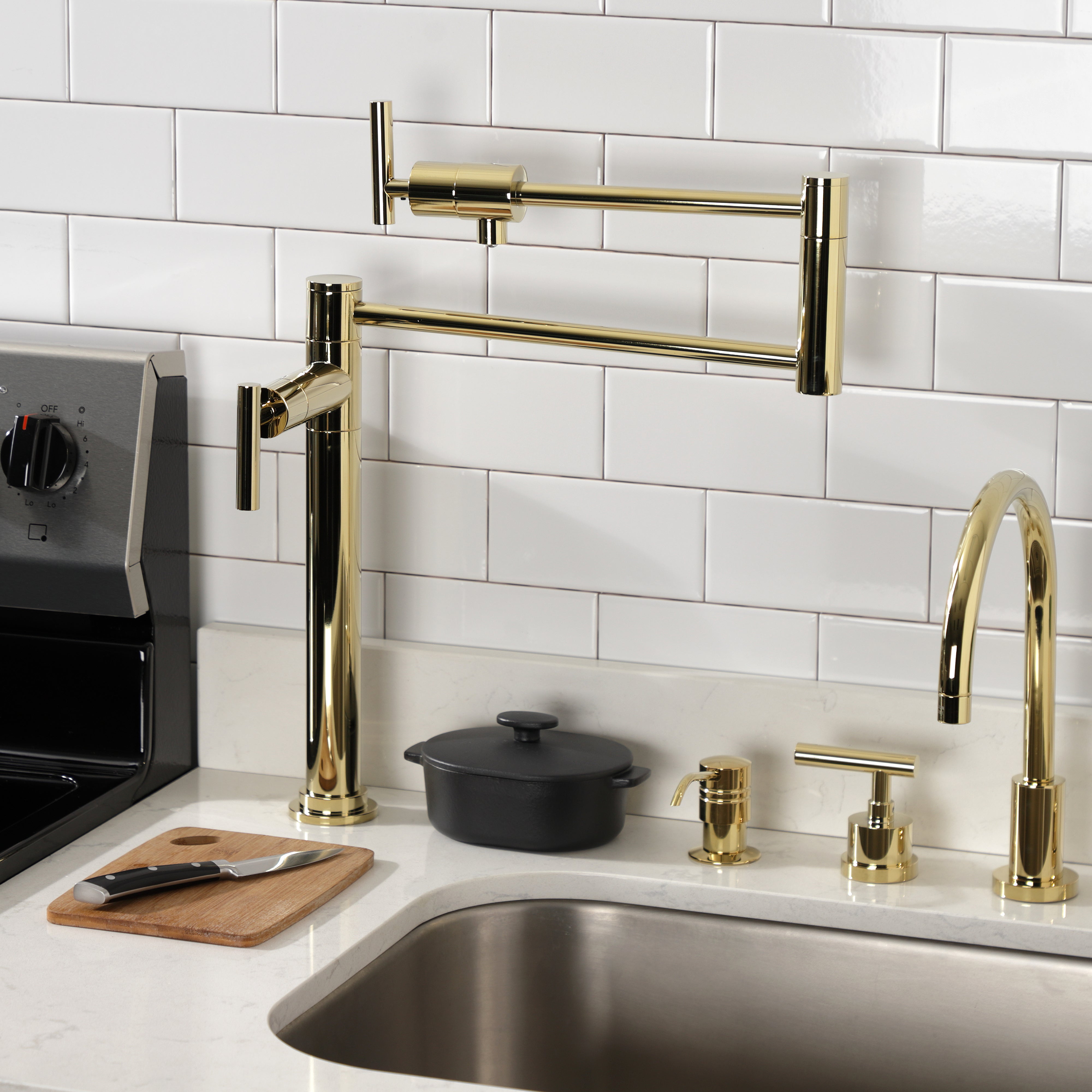 Kingston Brass KS4703CML Manhattan Deck Mount Pot Filler Faucet, Antique Brass in contemporary kitchen setting