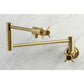 Kingston Brass KS4103DX Concord Wall Mount Pot Filler Faucet, Antique Brass on marble surface