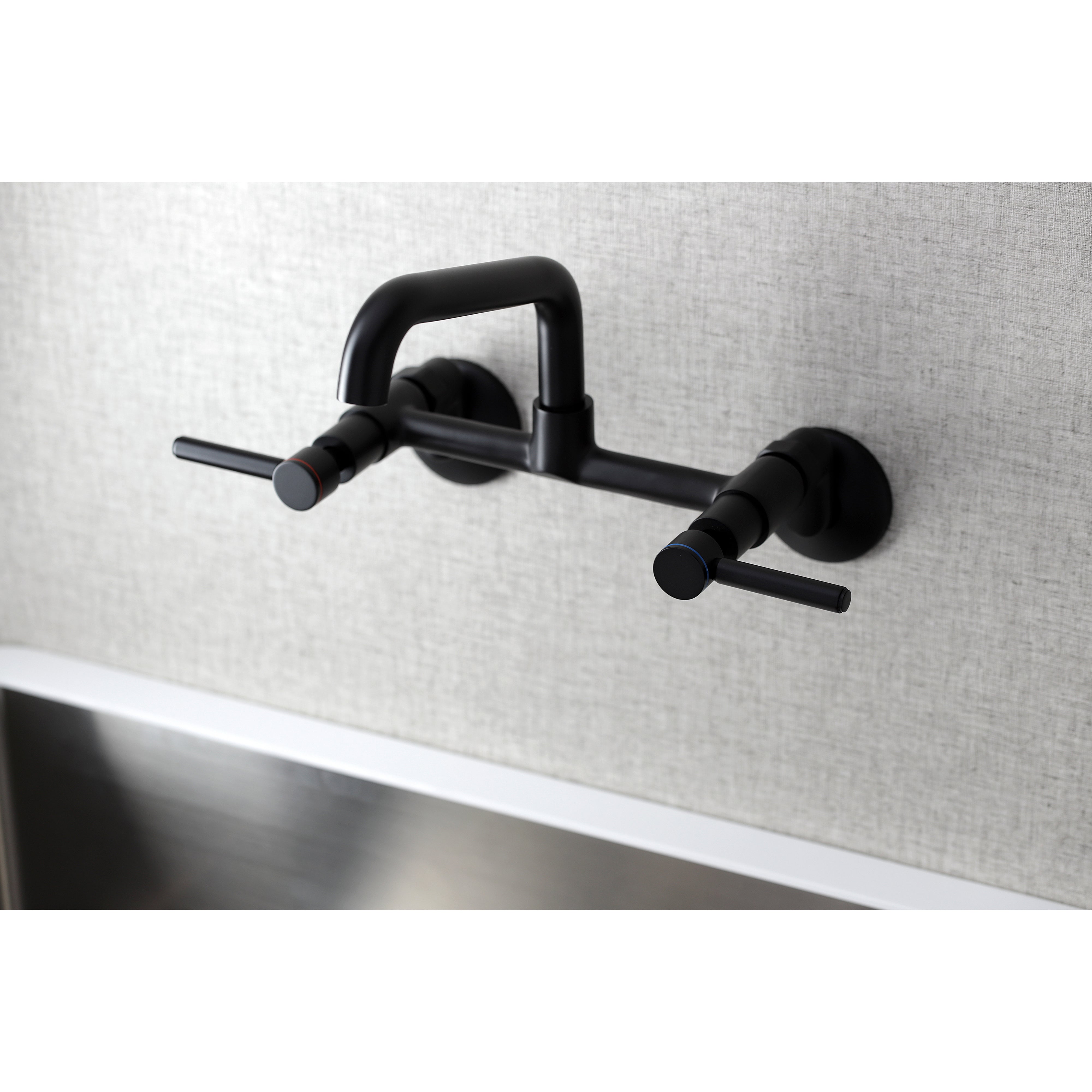 Kingston Brass KS823SB Concord Wall Mount Bridge Kitchen Faucet in matte black finish, showcasing contemporary design.