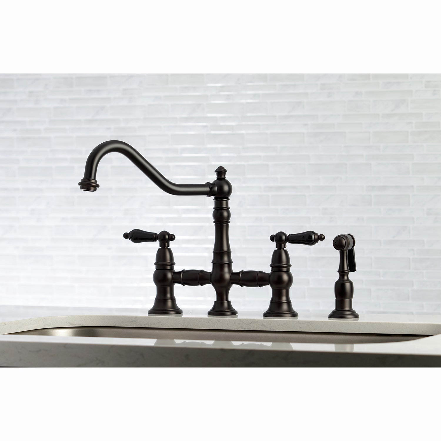 Kingston KS3277PKLBS Duchess Bridge Kitchen Faucet with Brass Sprayer, Brushed Brass in a kitchen setting