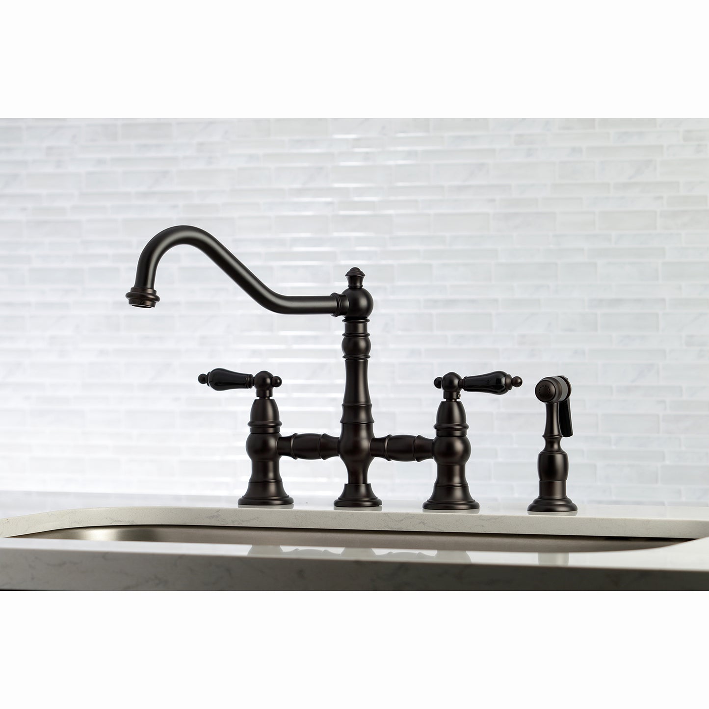 Kingston KS3277PKLBS Duchess Bridge Kitchen Faucet with Brass Sprayer, Brushed Brass in a kitchen setting