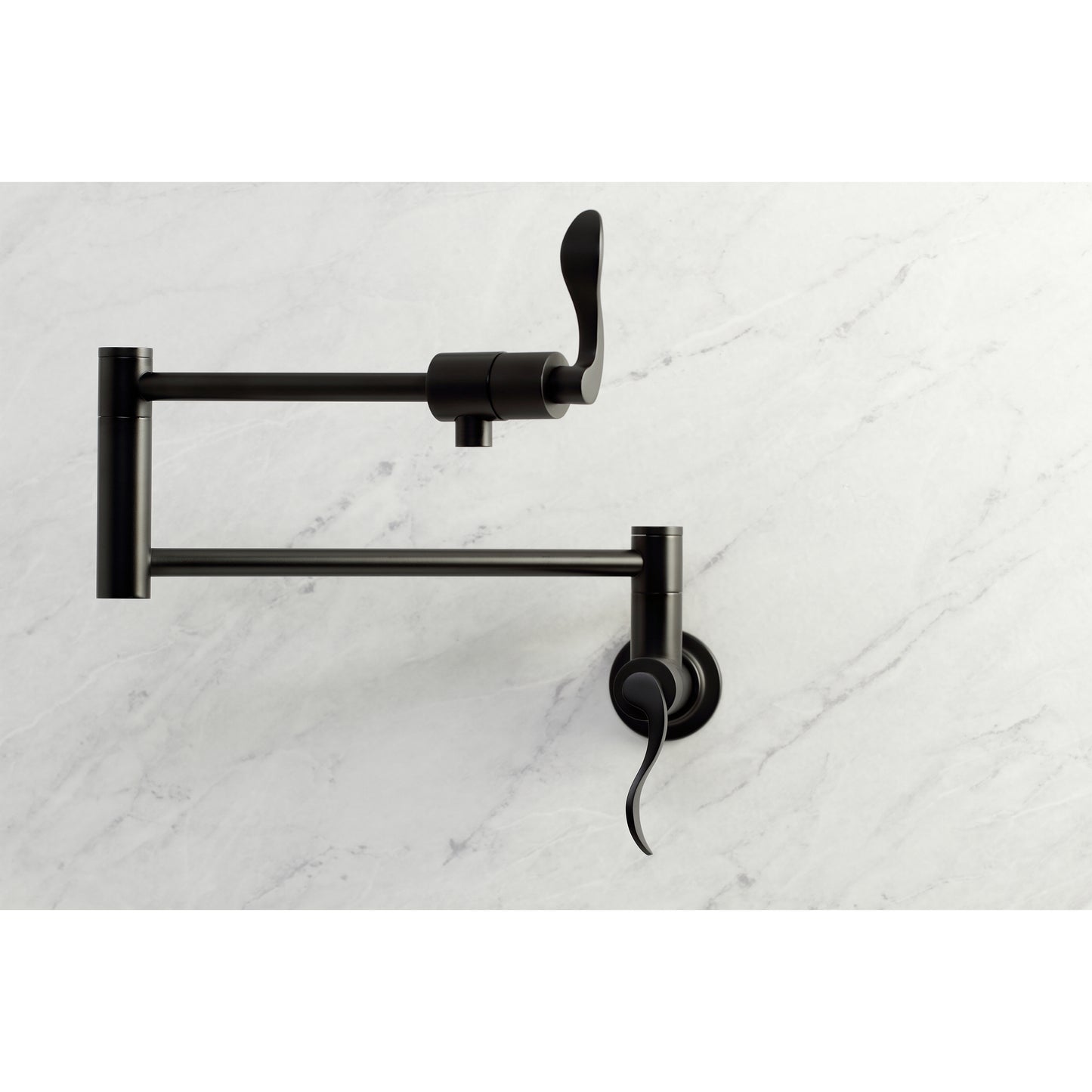 Kingston Brass KS4103DFL NuWave Wall Mount Pot Filler Faucet, Antique Brass on a marble background.