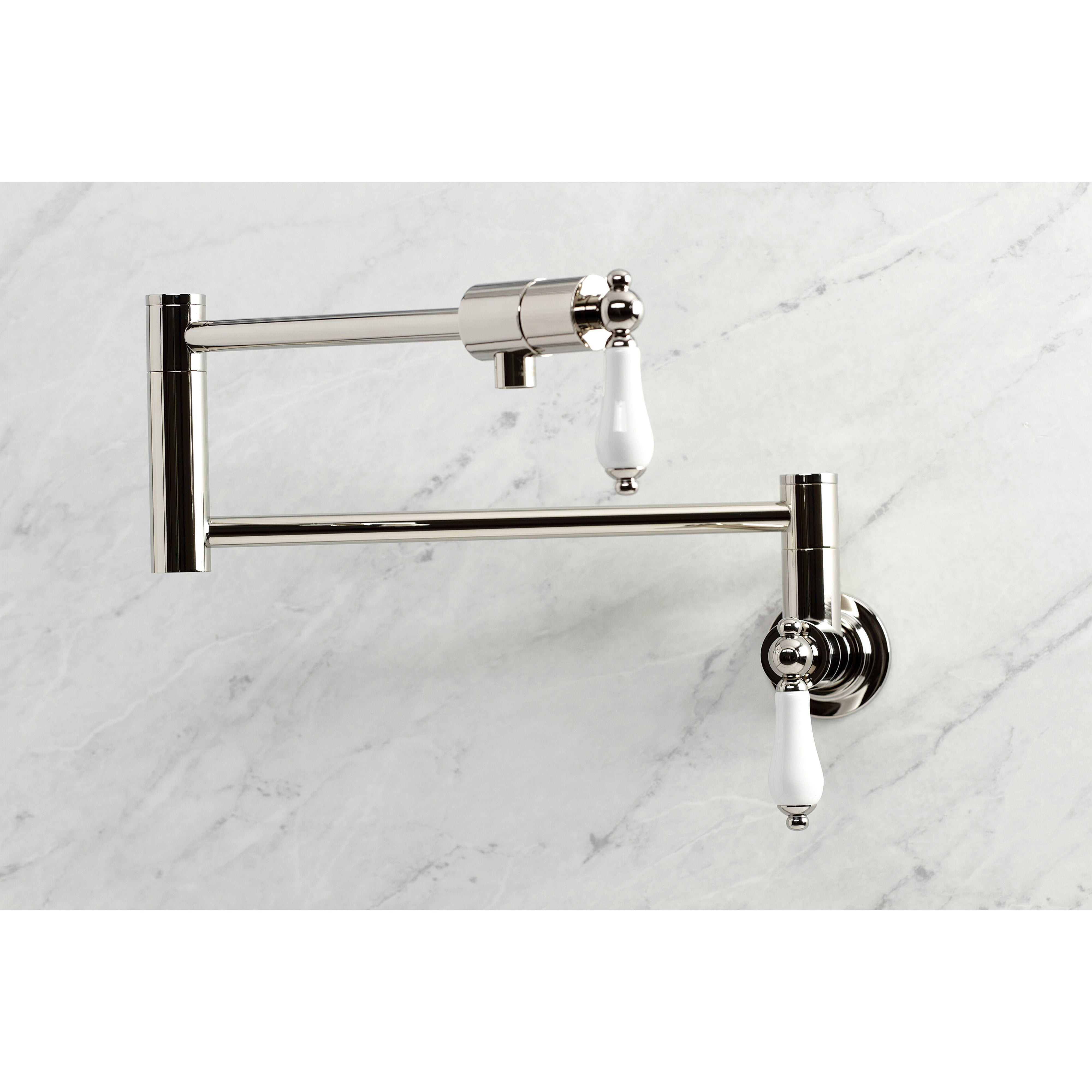 Kingston Brass KS4107PL Metropolitan Wall Mount Pot Filler Faucet, Brushed Brass - modern design with white handles.