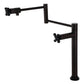 Kingston Brass KS4703PKX Duchess Deck Mount Pot Filler Faucet, Antique Brass with black porcelain handles.