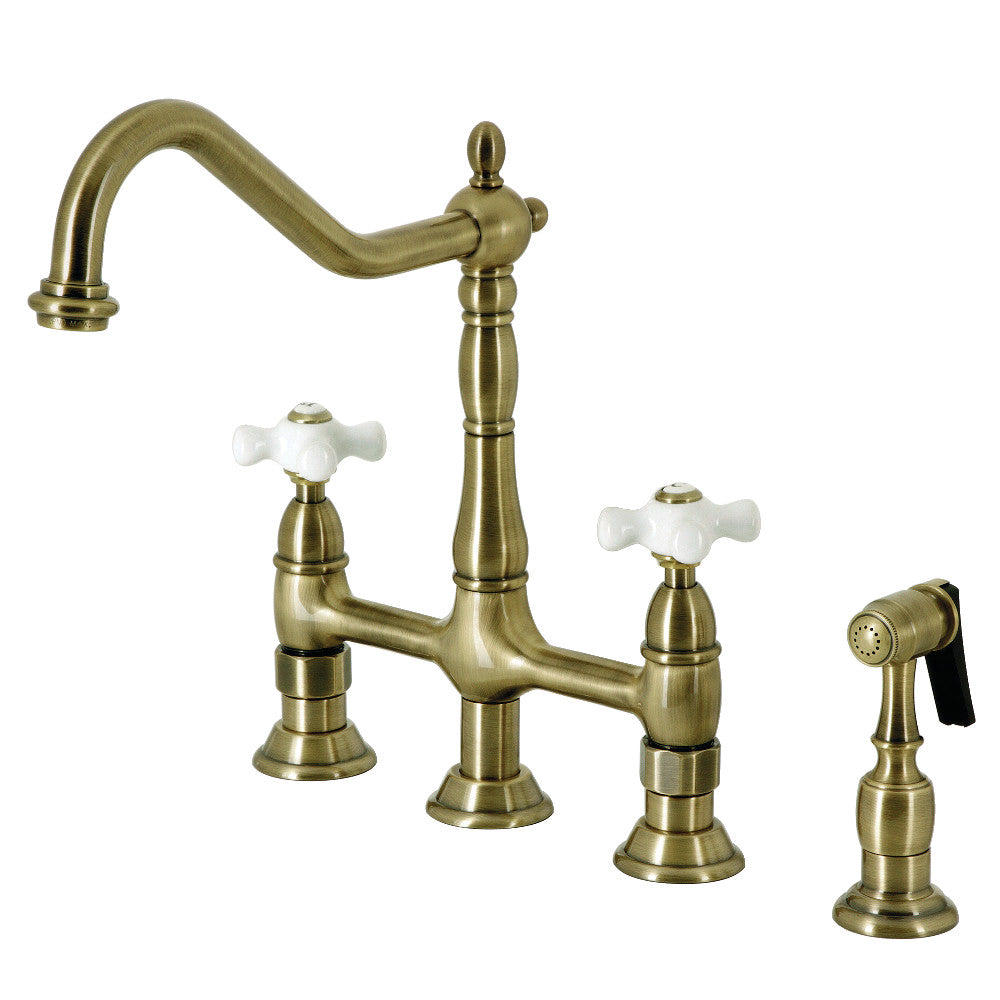 Kingston Brass Heritage Bridge Kitchen Faucet with Brass Sprayer and Cross Handles in Antique Brass finish
