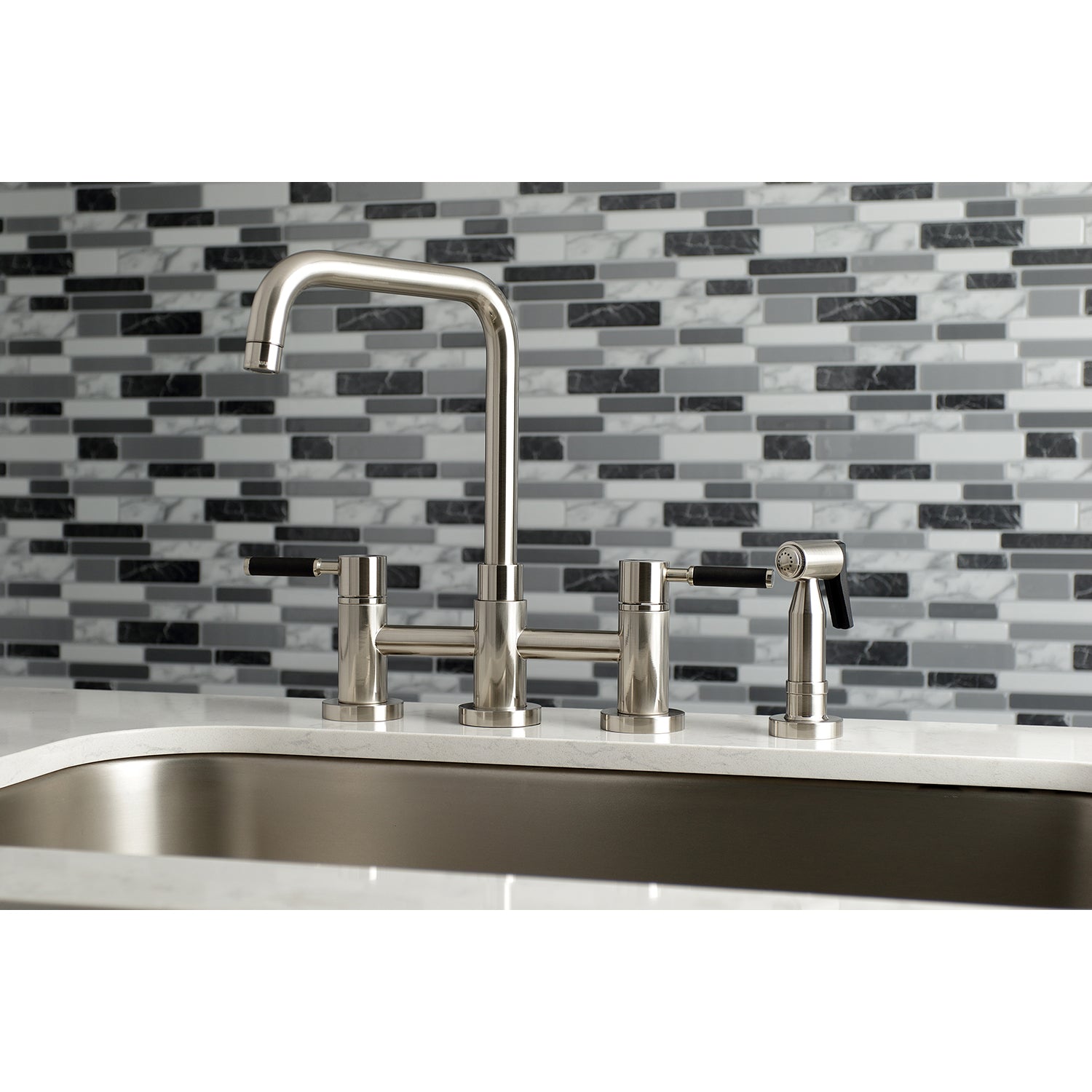 Kingston KS8287DKLBS Kaiser Bridge Kitchen Faucet with Brass Sprayer, Brushed Brass on modern kitchen countertop.