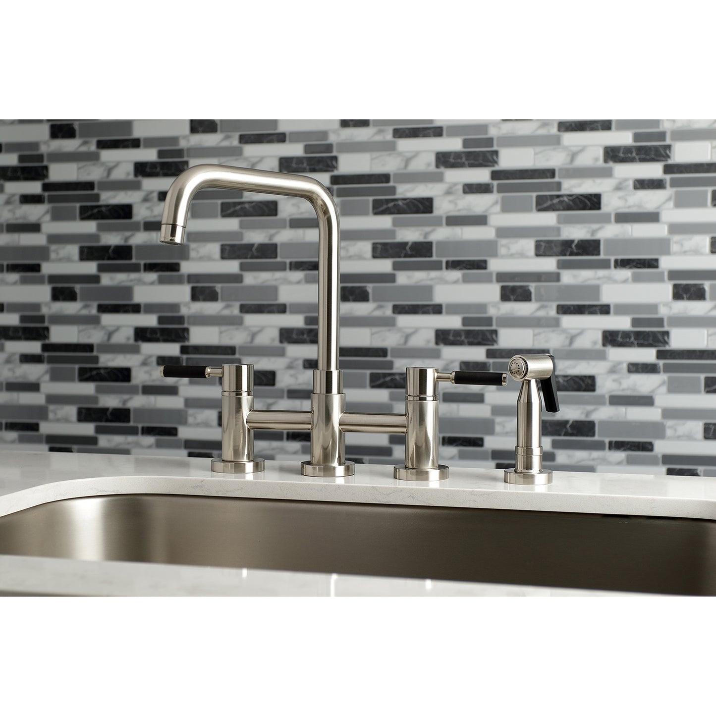 Kingston KS8287DKLBS Kaiser Bridge Kitchen Faucet with Brass Sprayer, Brushed Brass on modern kitchen countertop.