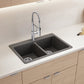 BLANCO Catris Semi-Pro Pull-Down Dual-Spray Kitchen Faucet installed over a double basin sink in a modern kitchen.