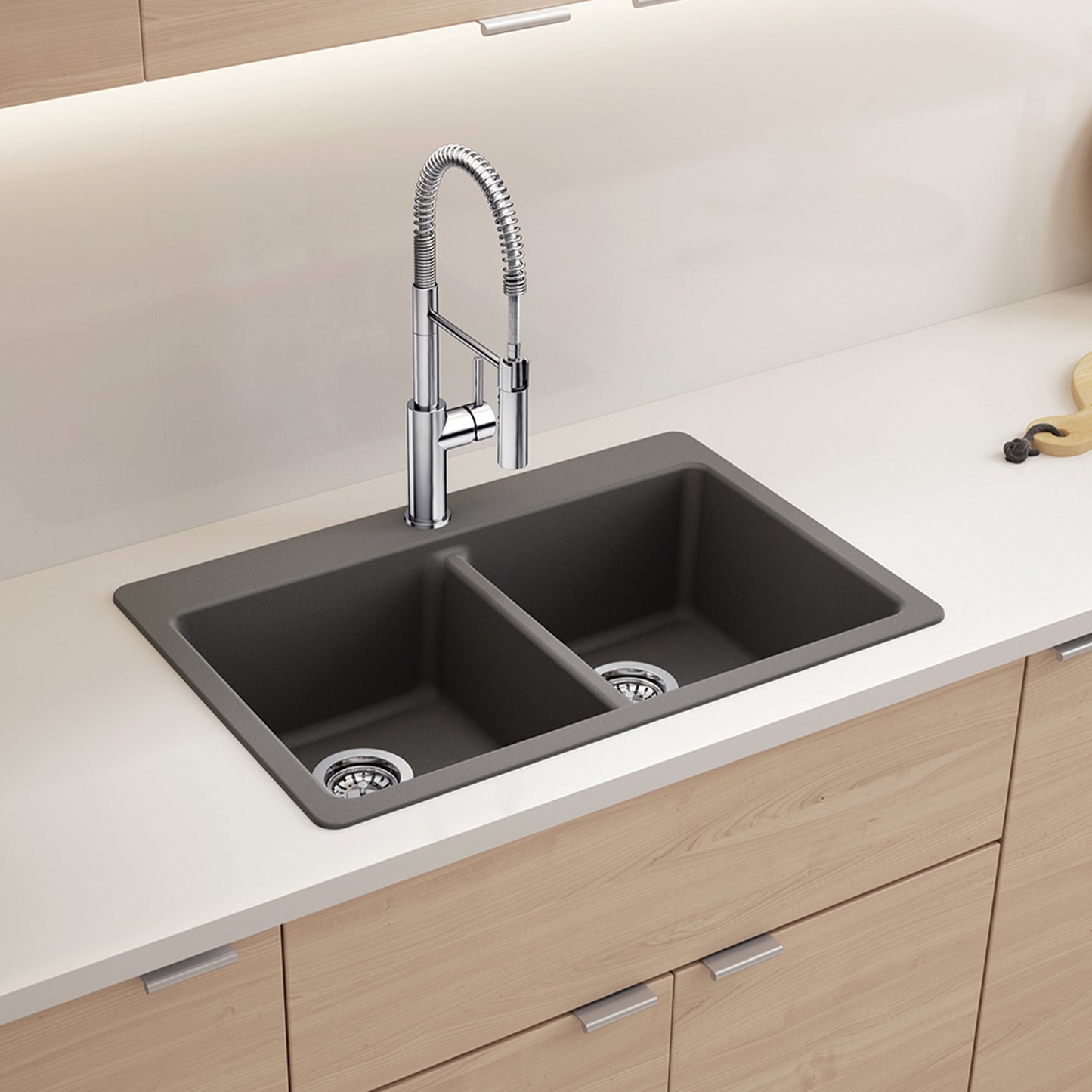 BLANCO Catris Semi-Pro Pull-Down Dual-Spray Kitchen Faucet installed over a double basin sink in a modern kitchen.