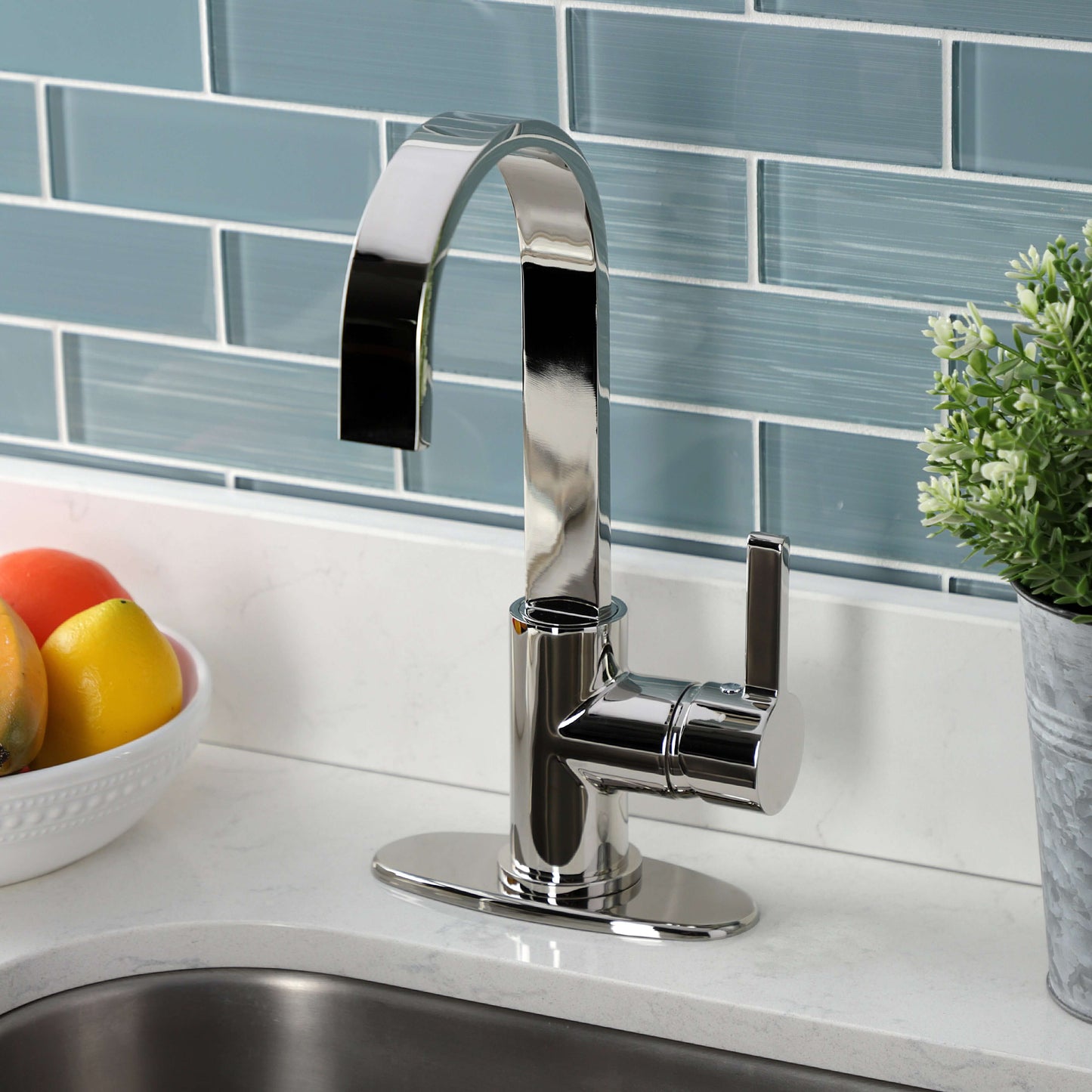 Kingston Brass LS8613CTL Continental Single-Handle Bar Faucet right side view with gooseneck spout on a countertop.