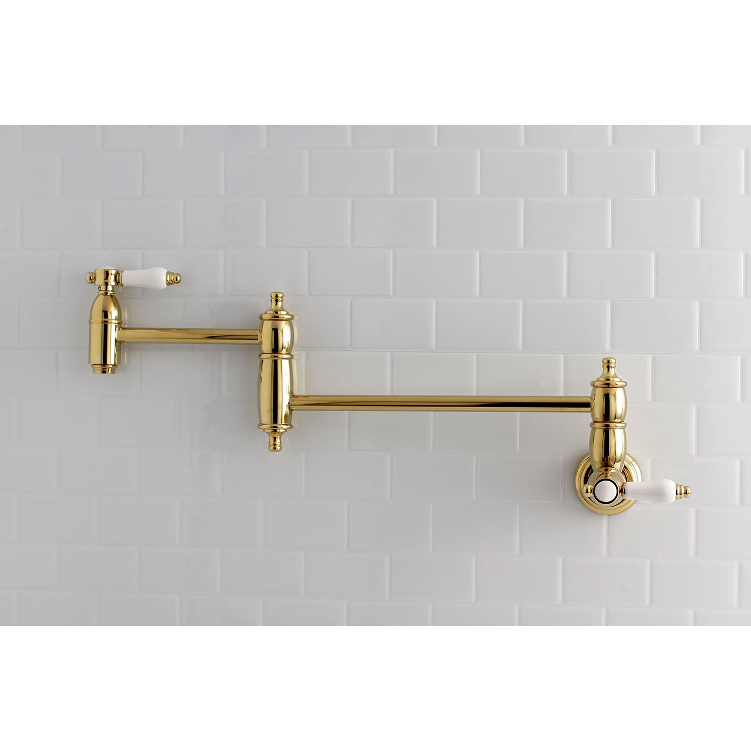 Kingston Brass KS3103BPL Bel-Air Wall Mount Pot Filler Faucet, Antique Brass with porcelain levers and elegant design.