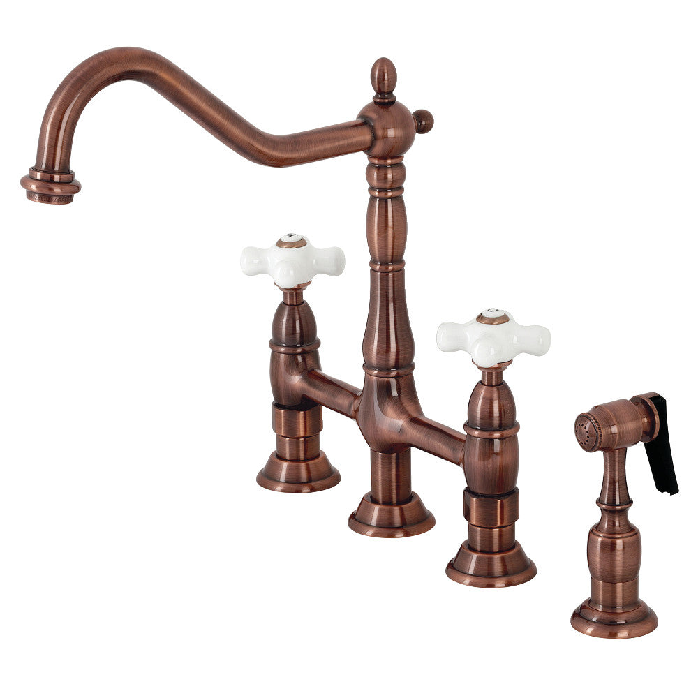 Kingston Brass Heritage Bridge Kitchen Faucet with Brass Sprayer and Cross Handles in Antique Copper finish