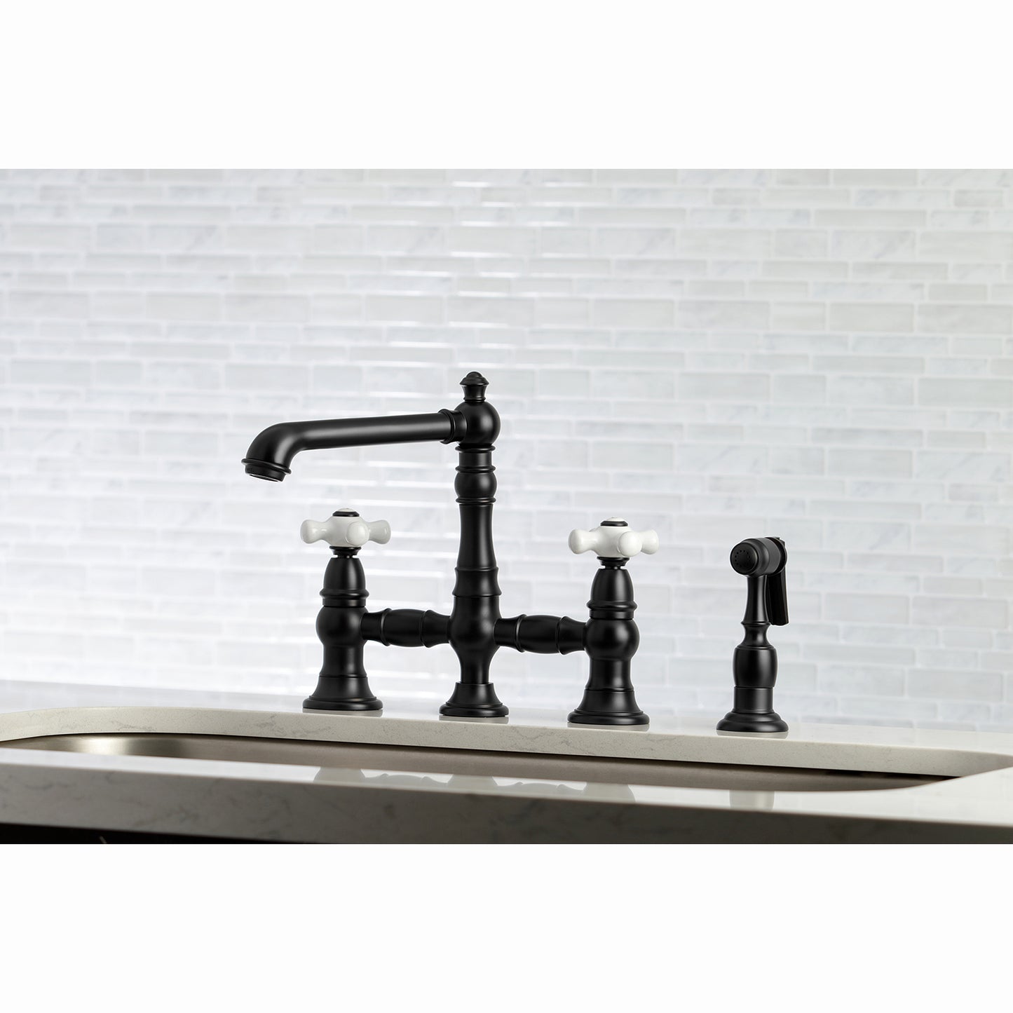 Kingston KS7277PXBS English Country Bridge Kitchen Faucet with Brass Sprayer, Brushed Brass in a stylish black finish.