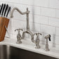 Kingston KS7753TXBS French Country Bridge Kitchen Faucet with Brass Sprayer, Antique Brass displayed in kitchen setting.