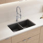 BLANCO Catris Semi-Pro Pull-Down Dual-Spray Kitchen Faucet installed in modern kitchen sink with dual bowl.