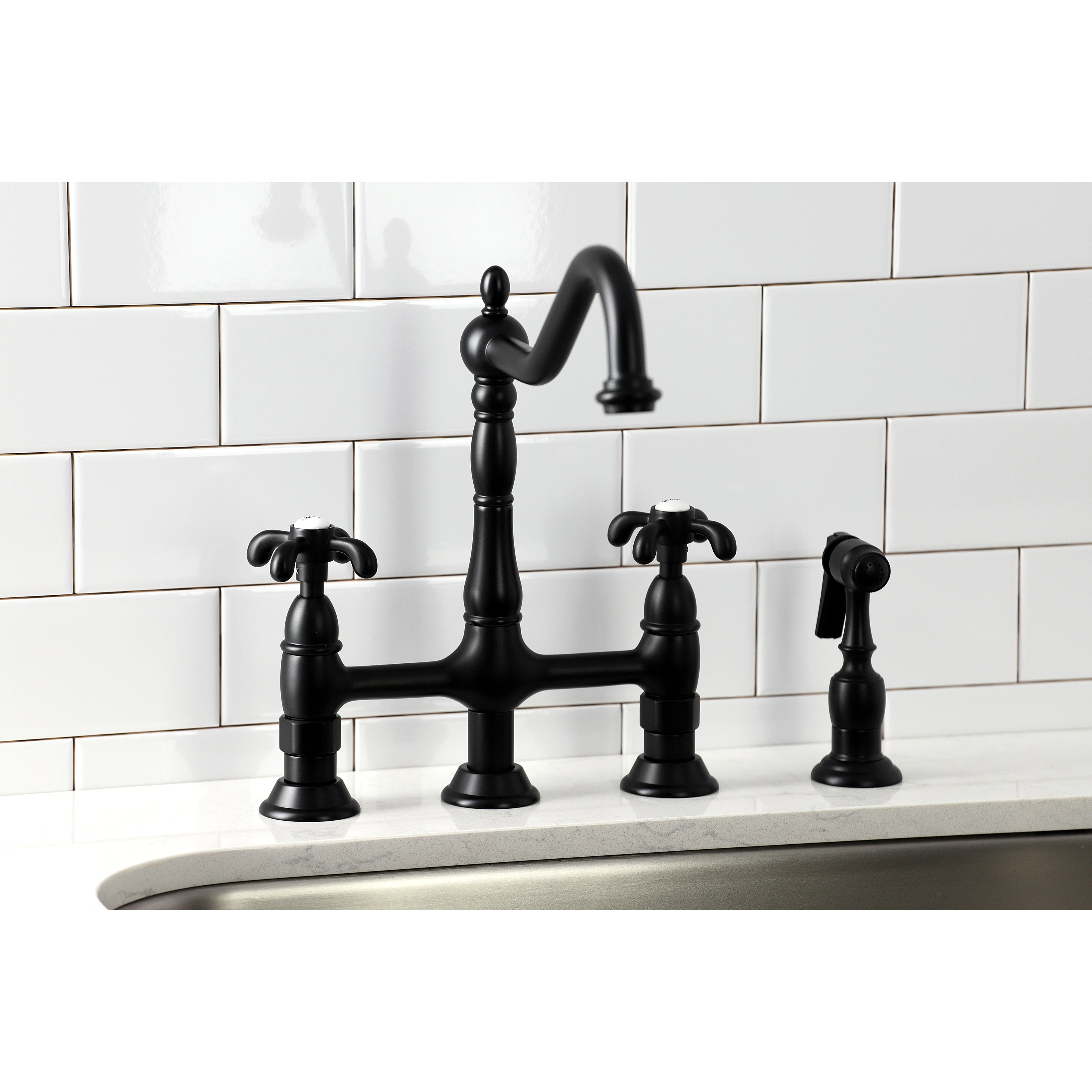 Kingston KS1277TXBS French Country Bridge Kitchen Faucet with Brass Sprayer, Brushed Brass in black finish.