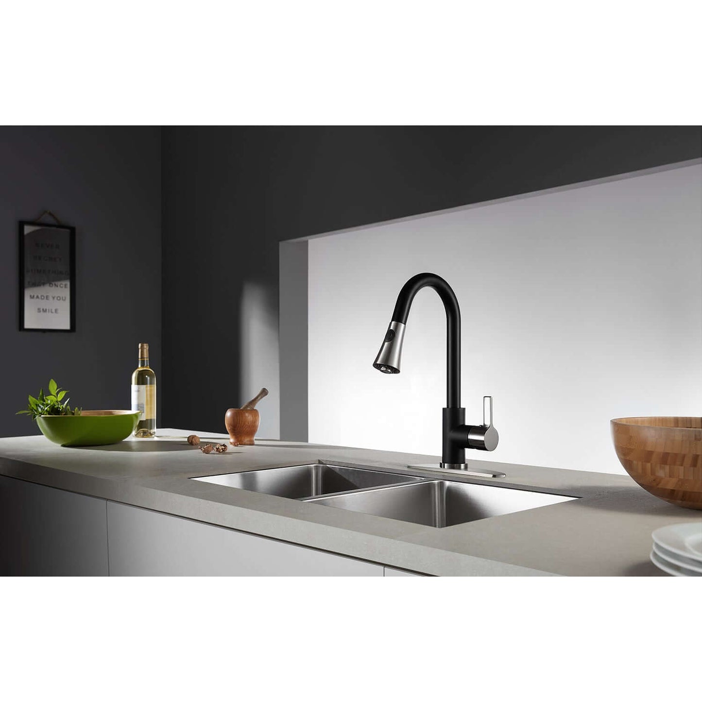 Kingston Brass LS8723CTL Continental Pull-Down Kitchen Faucet in black, modern curved spout on kitchen countertop, left side view.