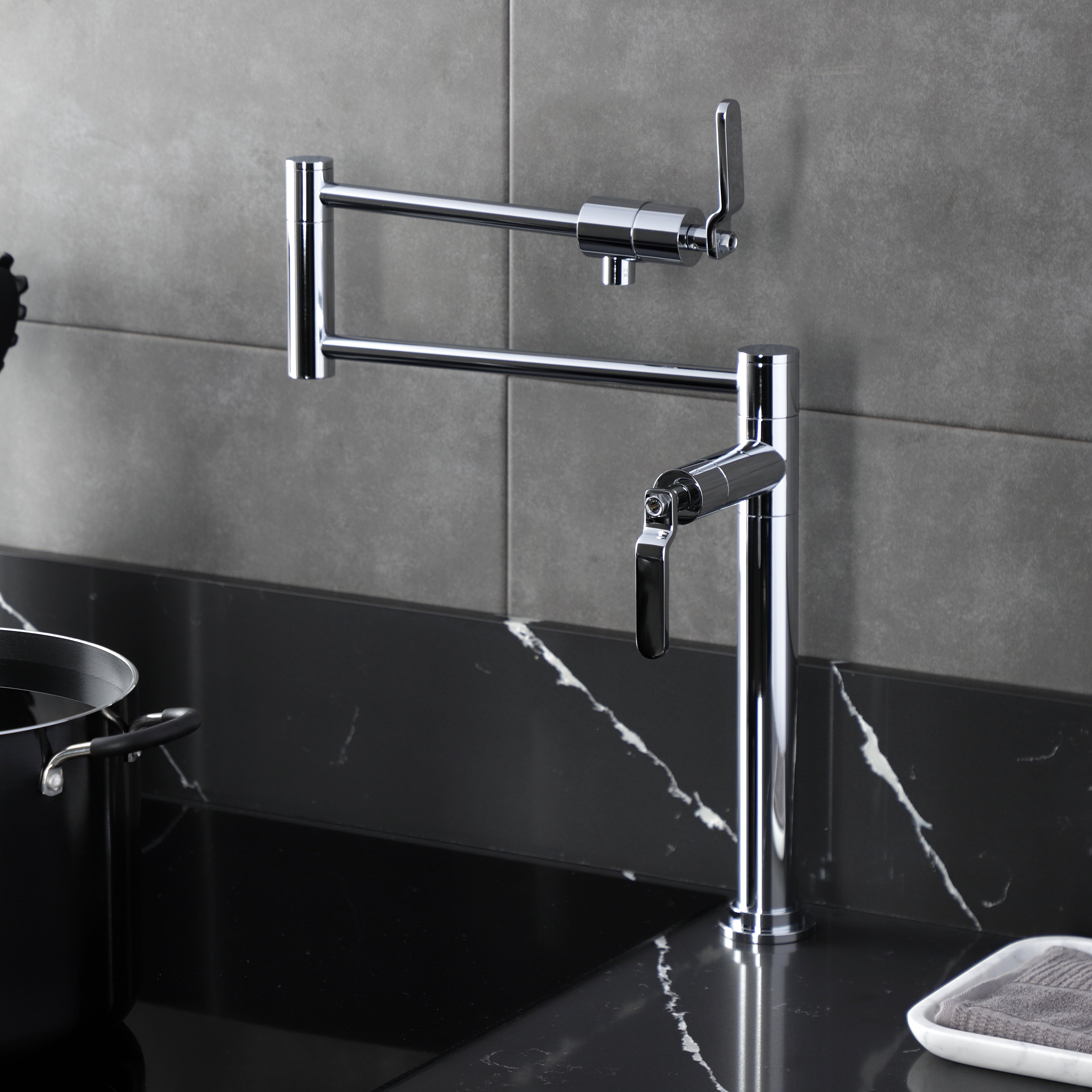 Kingston Brass KS4703KL Whitaker Deck Mount Pot Filler Faucet, Antique Brass in a modern kitchen setting.