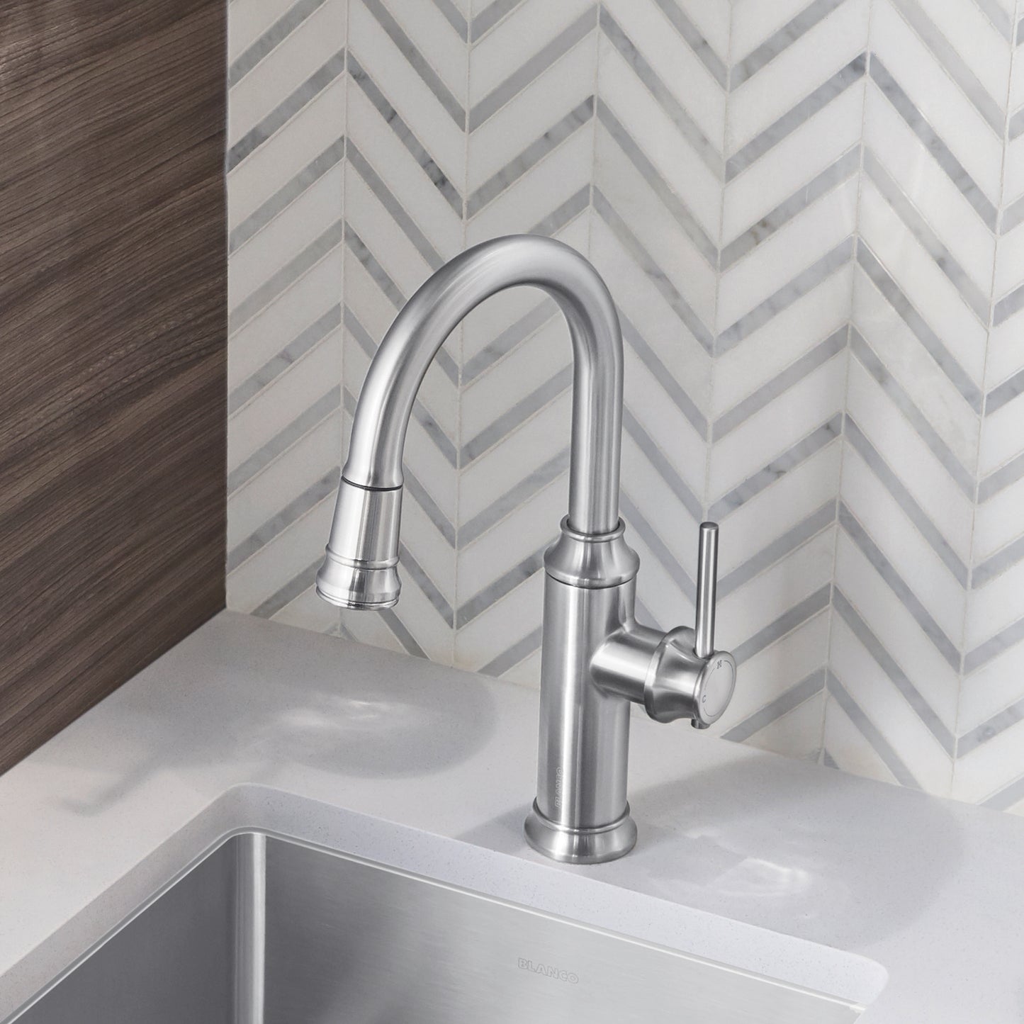 BLANCO Empressa Pull-Down Bar Faucet in a contemporary kitchen setting with sleek design.