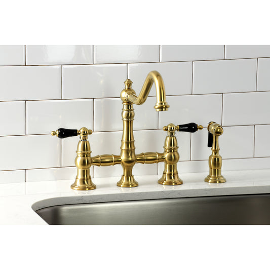 Kingston KS3277PKLBS Duchess Bridge Kitchen Faucet with Brass Sprayer, Brushed Brass in elegant kitchen setting
