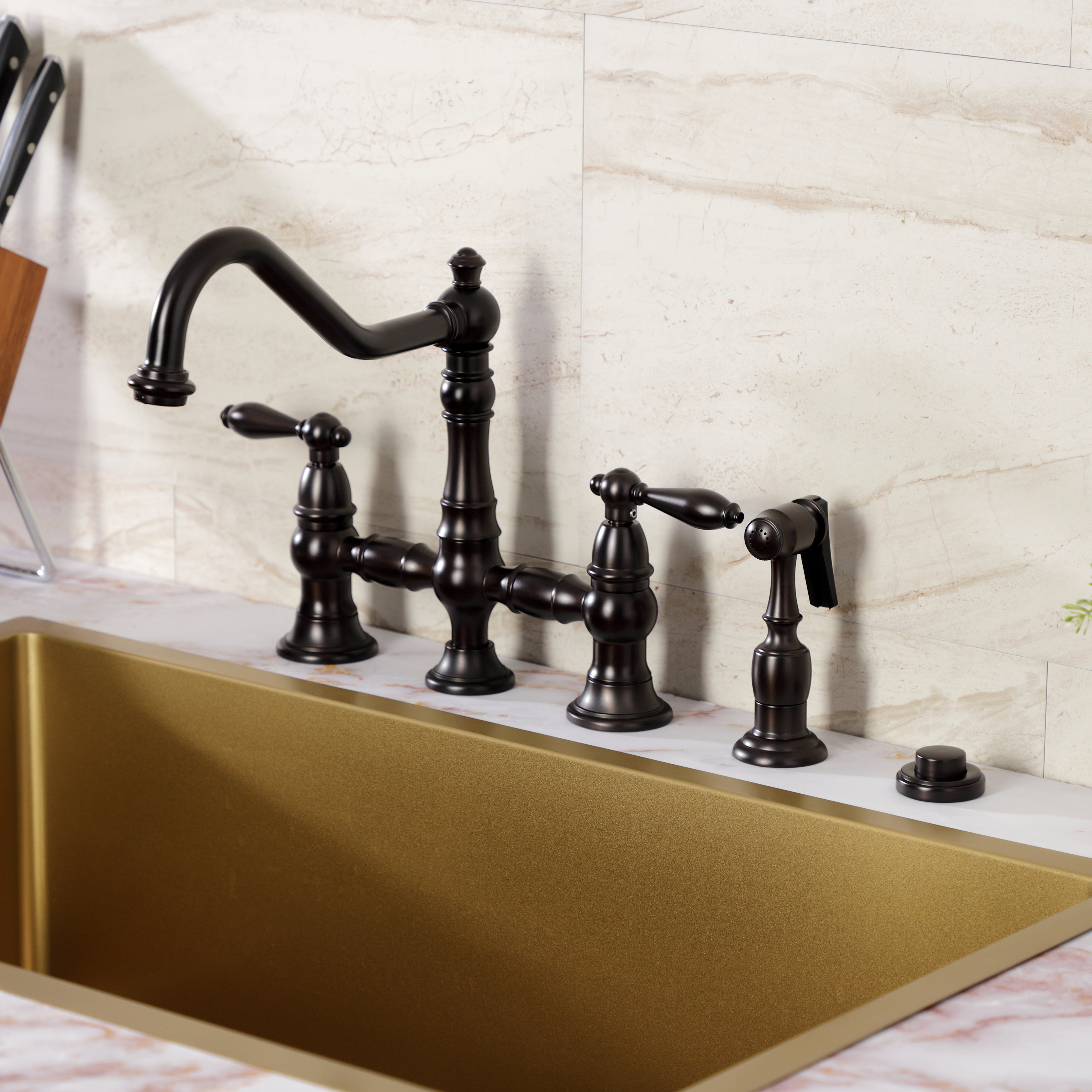 Kingston KS3277ALBS Restoration Bridge Kitchen Faucet with Brass Sprayer, Brushed Brass in a stylish kitchen setting.