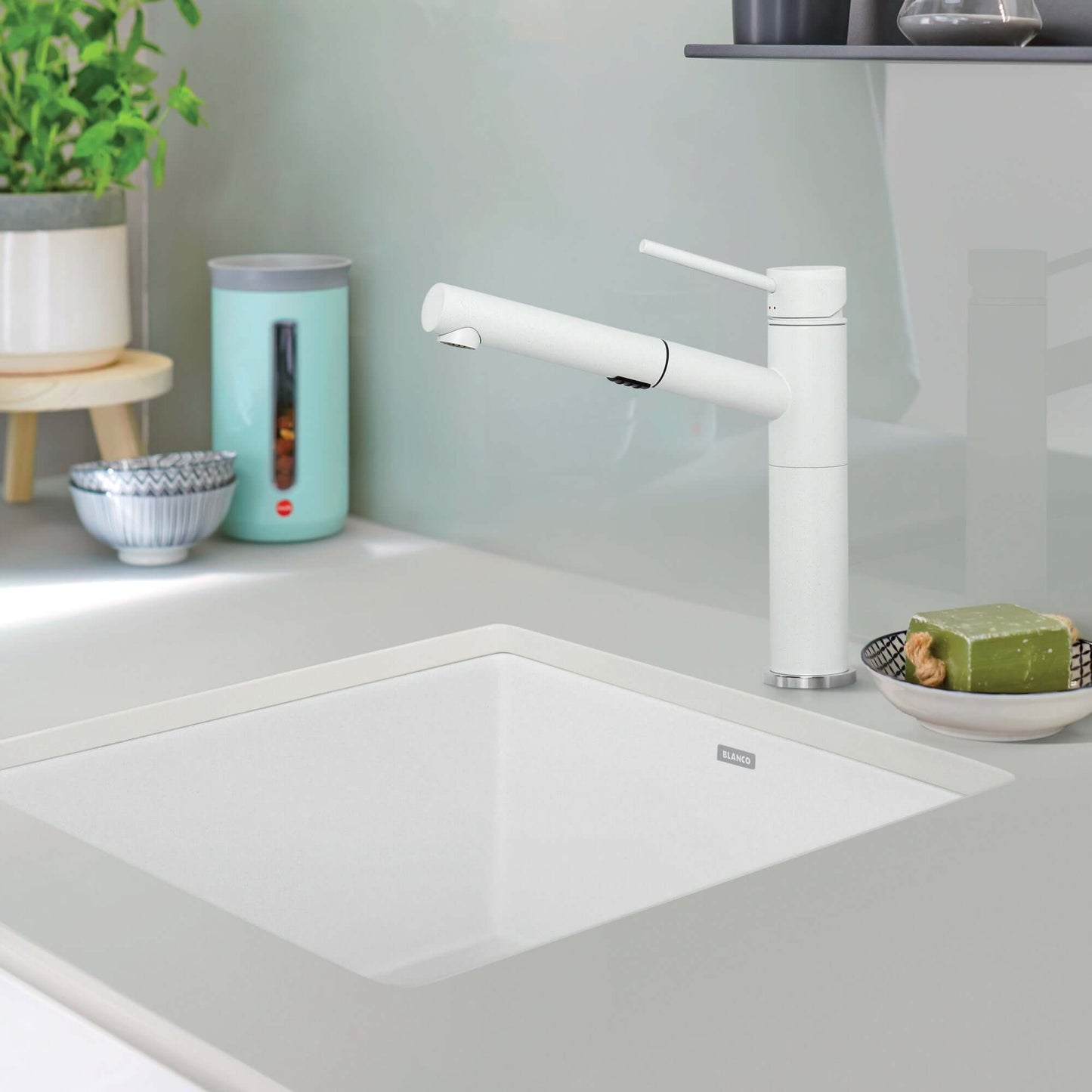 BLANCO Precis SILGRANIT 21" Single Bowl Undermount Kitchen Sink in white with modern faucet and countertop setup