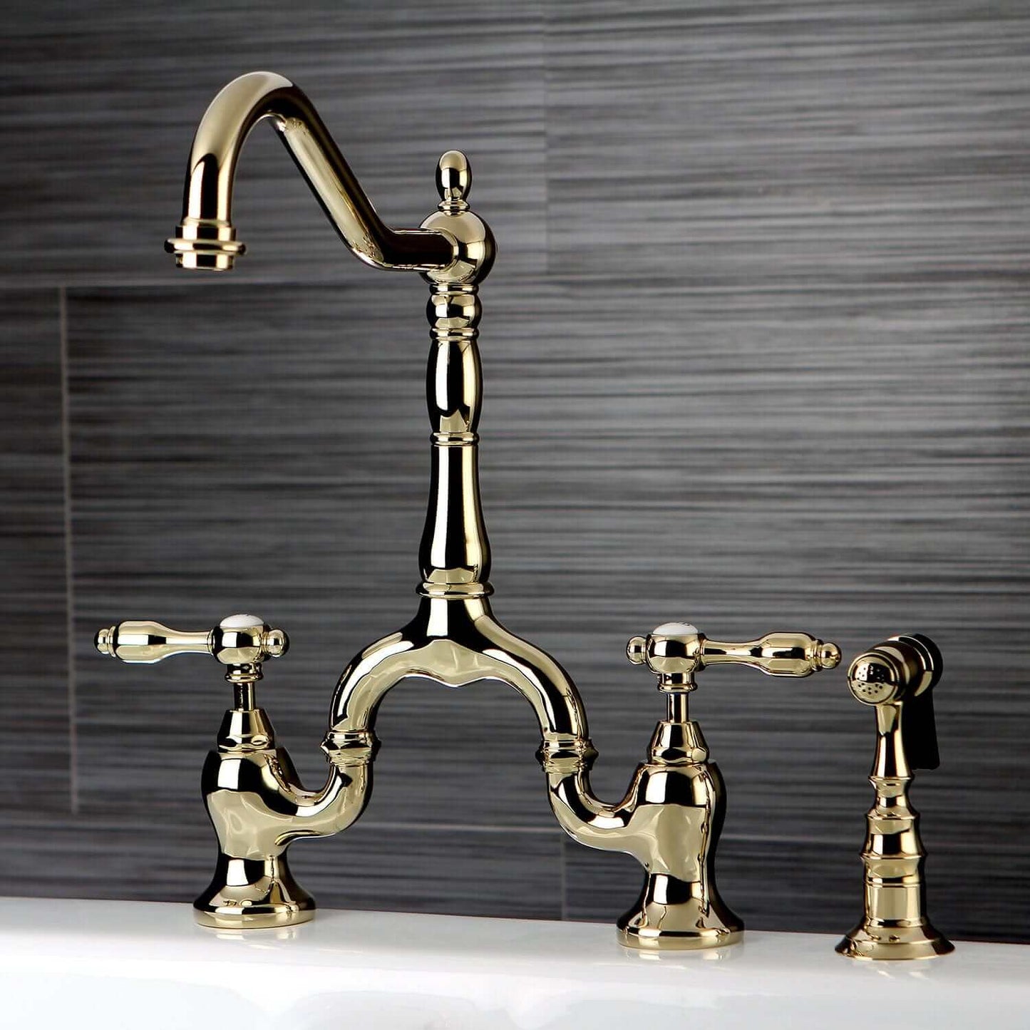 KINGSTON Brass Tudor Bridge Kitchen Faucet with Brass Sprayer - Polished Brass