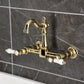 Kingston KS2443BPL Bel-Air Two-Handle Wall Mount Bridge Kitchen Faucet, Antique Brass on a stylish wall.