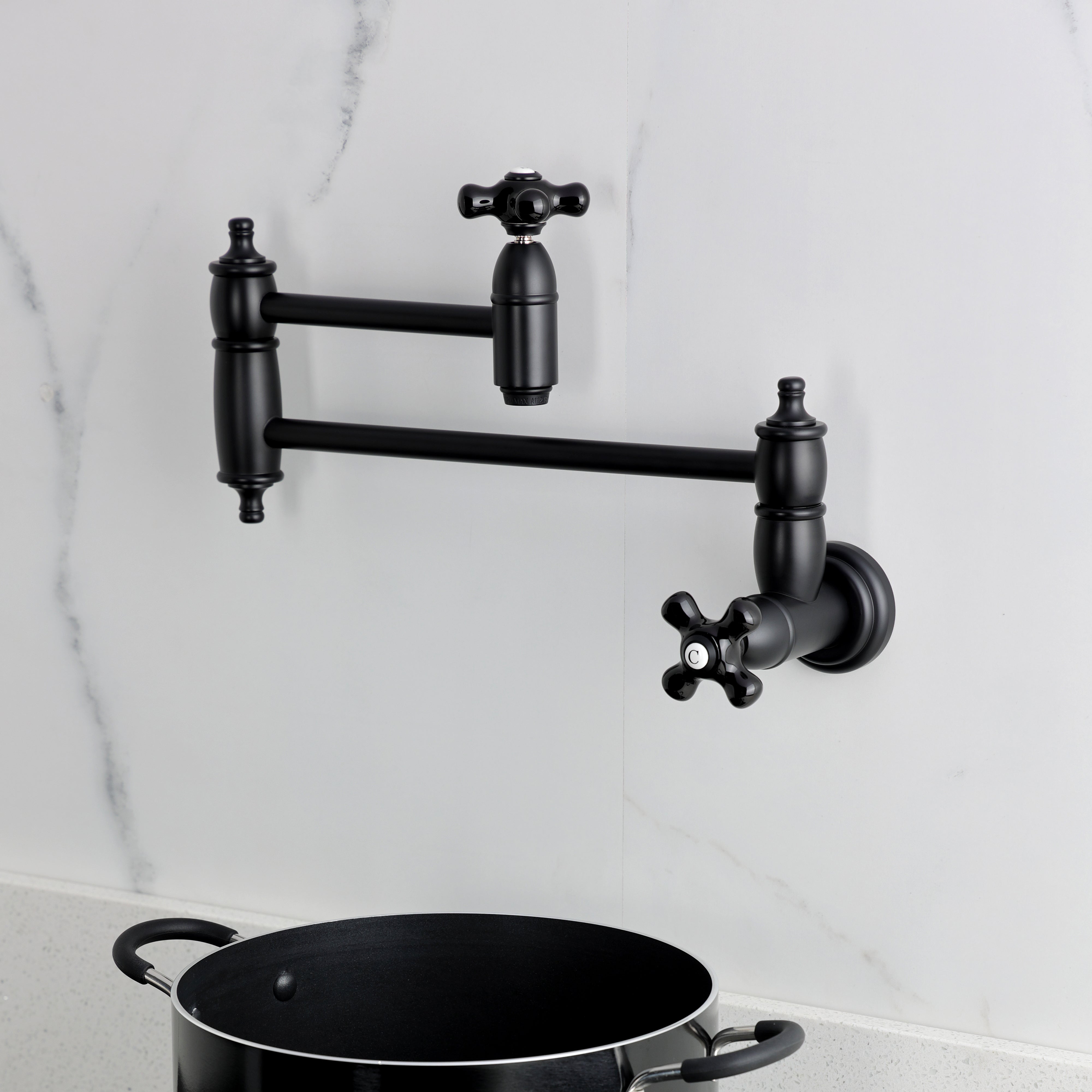 Kingston Brass KS3103PKX Duchess Wall Mount Pot Filler Faucet, Antique Brass with porcelain handles