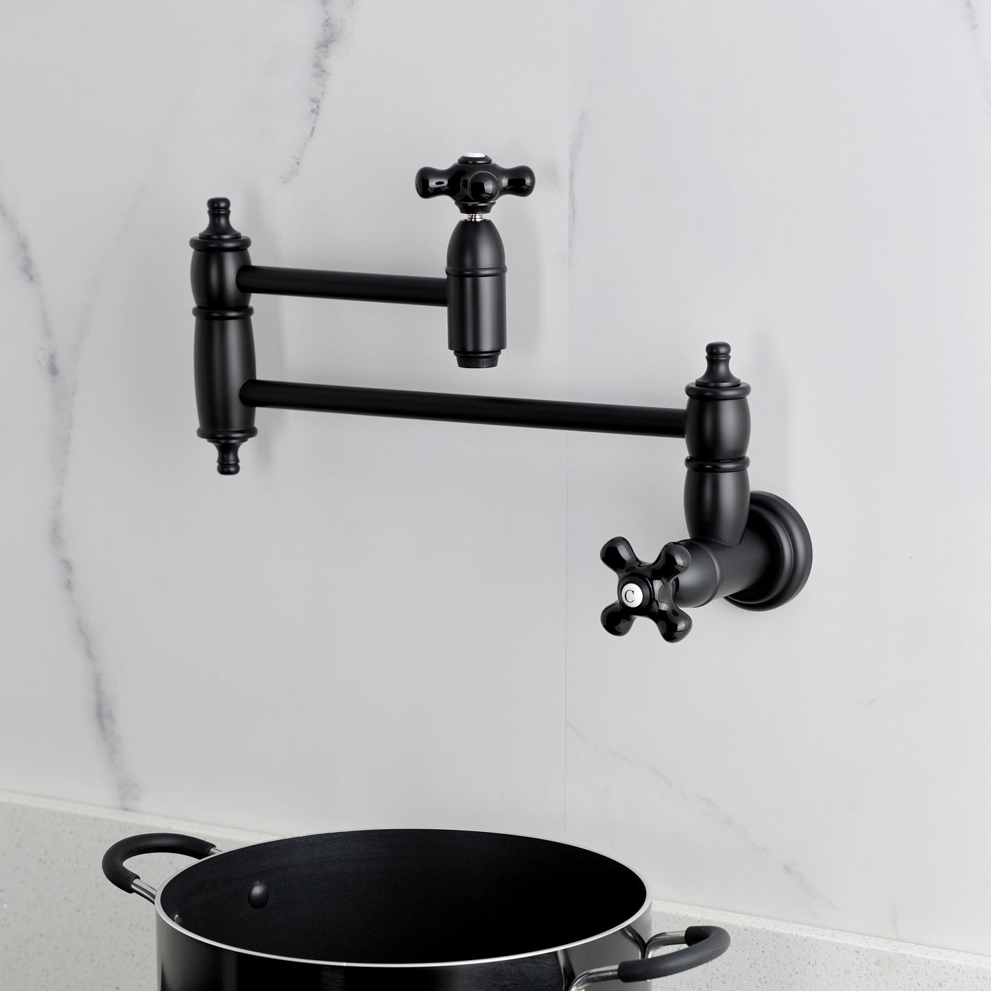 Kingston Brass KS3103PKX Duchess Wall Mount Pot Filler Faucet, Antique Brass with porcelain handles
