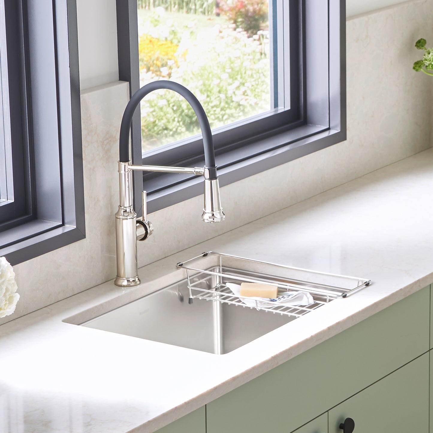 BLANCO Quatrus R15 25" Single Bowl Dual Mount Stainless Steel Laundry Sink with modern faucet and countertop.