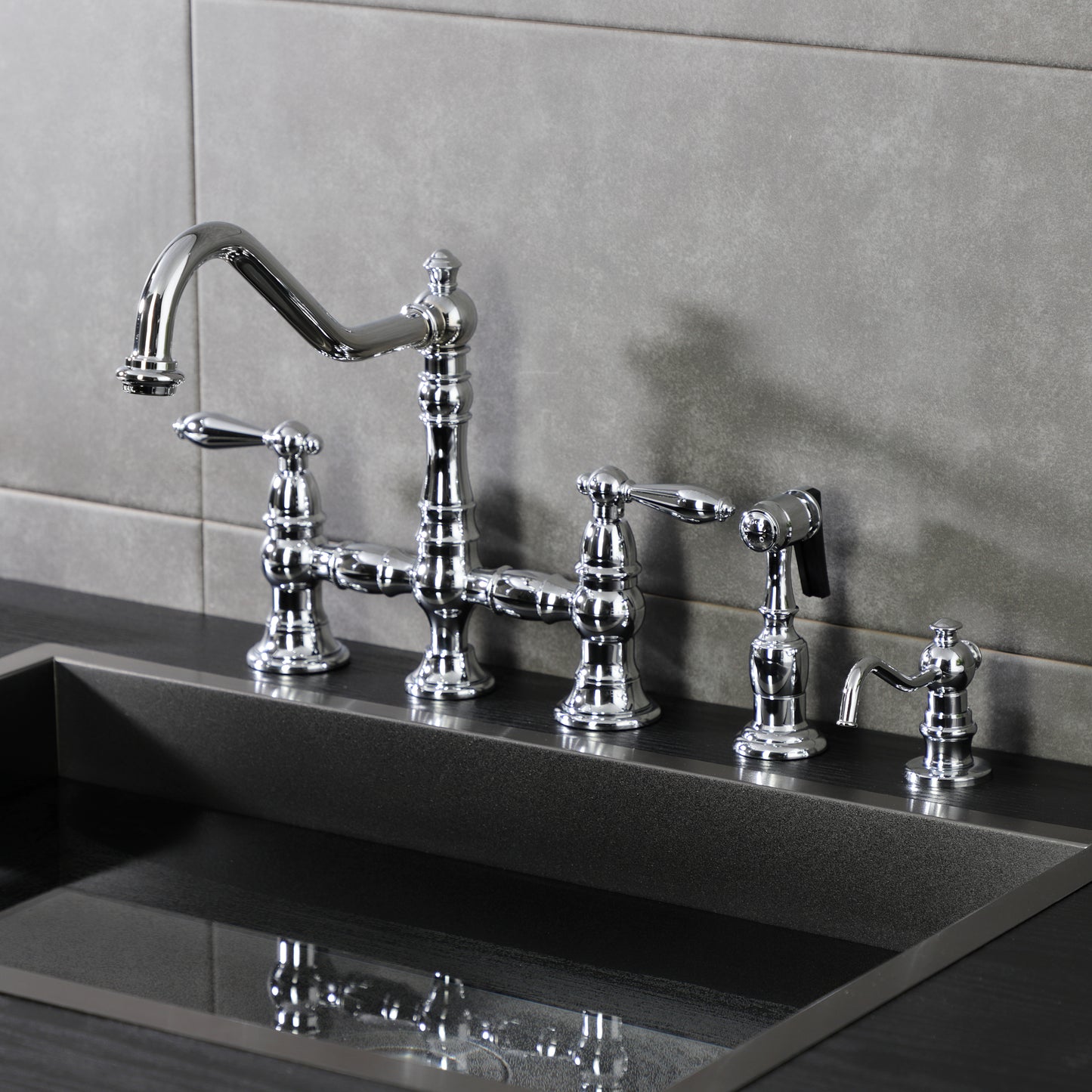 Kingston KS3277ALBS Restoration Bridge Kitchen Faucet with Brass Sprayer, Brushed Brass in a modern kitchen setting.