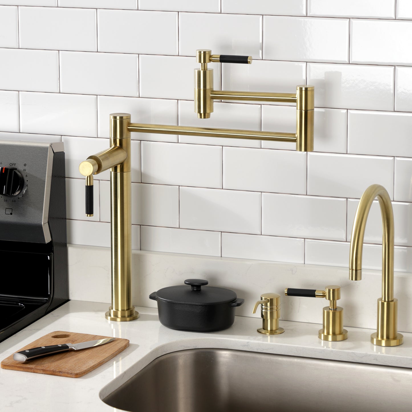 Kingston Brass KS8707DKL Kaiser Deck Mount Pot Filler Faucet, Brushed Brass installed in a modern kitchen setting.