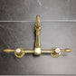 Kingston KS1263TAL Tudor Two-Handle Wall Mount Bridge Kitchen Faucet, Antique Brass
