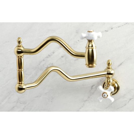 Kingston Brass KS2107PX Heritage Wall Mount Pot Filler Faucet, Brushed Brass on a marble surface