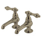 Kingston Brass CC1L8 Vintage Basin Tap Faucet with Metal Lever Handle, dual taps in polished finish.