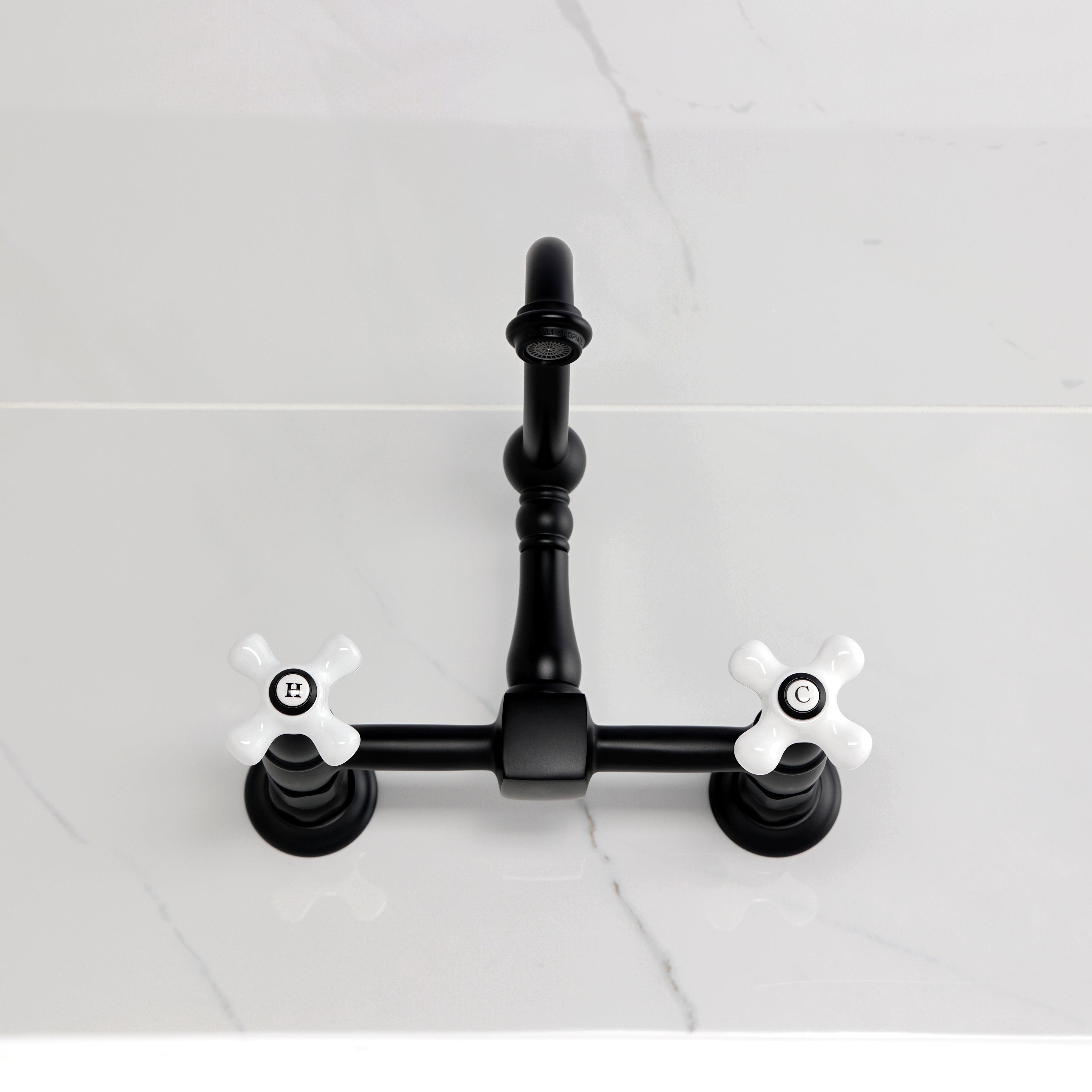 Kingston KS1263PX Heritage Two-Handle Wall Mount Bridge Kitchen Faucet, Antique Brass with black finish