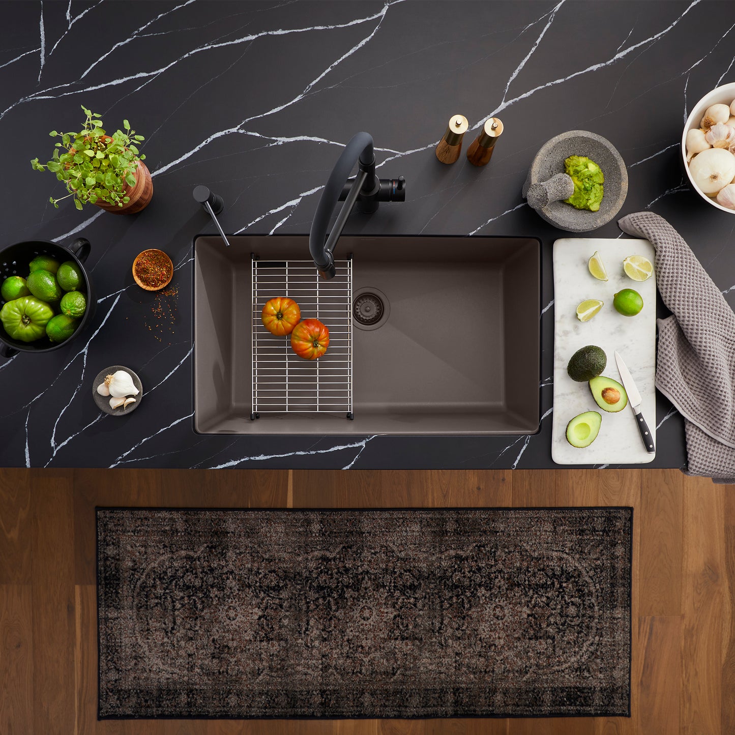 BLANCO Precis SILGRANIT 30" Single Bowl Undermount Kitchen Sink with fresh produce on a marble countertop.